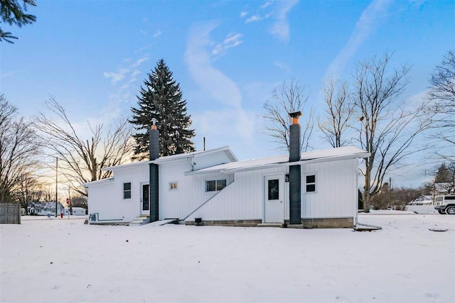 view of snow covered property