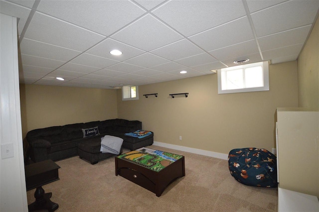 living room featuring carpet and plenty of natural light