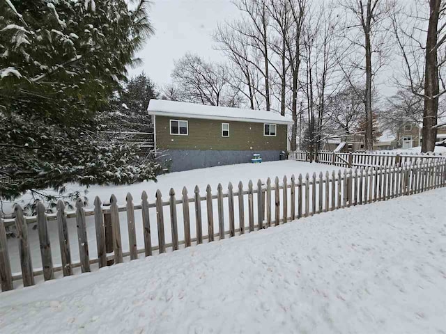 view of yard covered in snow