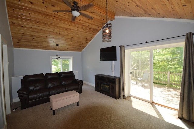 carpeted living room featuring lofted ceiling with beams, ceiling fan, and wood ceiling