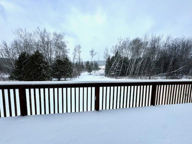 view of snow covered deck