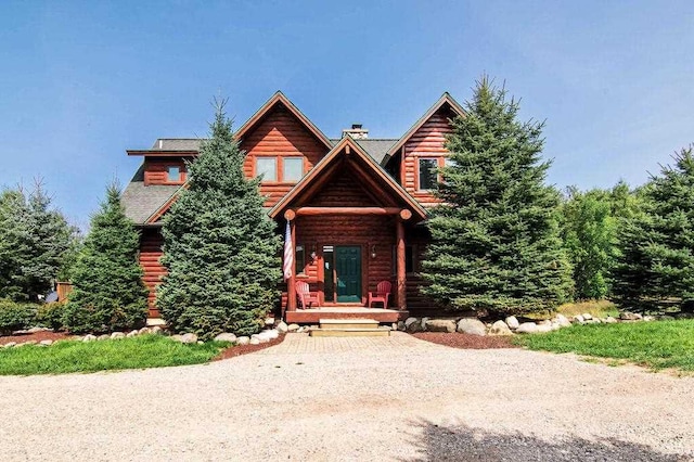 view of log cabin