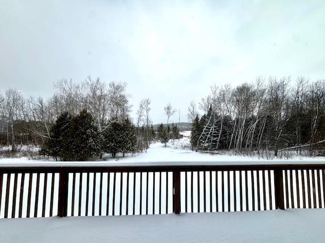 view of snow covered deck