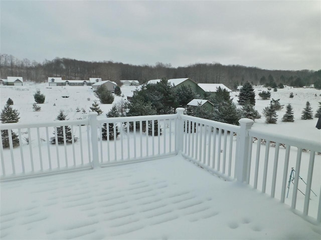 view of snow covered deck