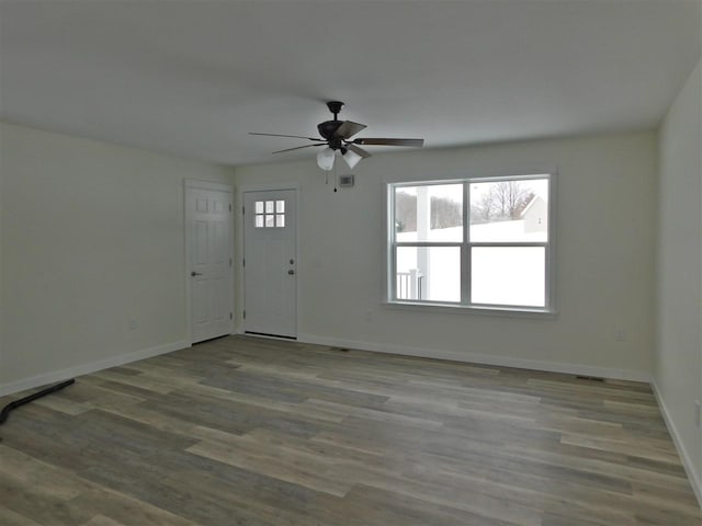 entrance foyer with light hardwood / wood-style floors and ceiling fan