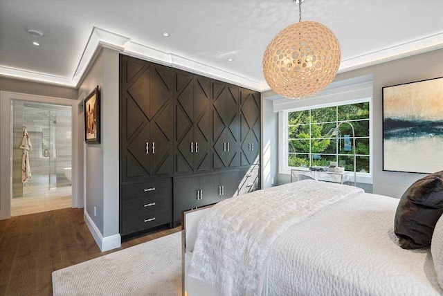 bedroom featuring dark hardwood / wood-style floors