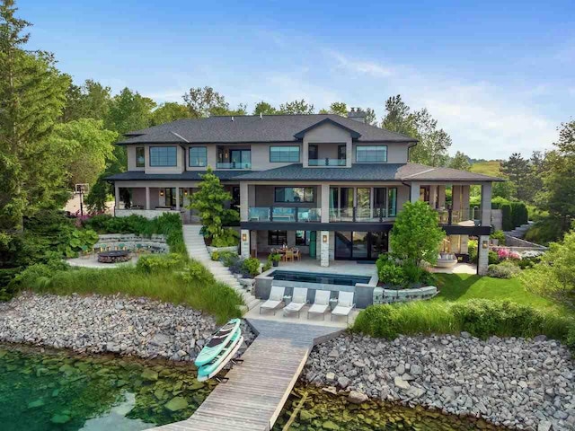 rear view of house with a patio