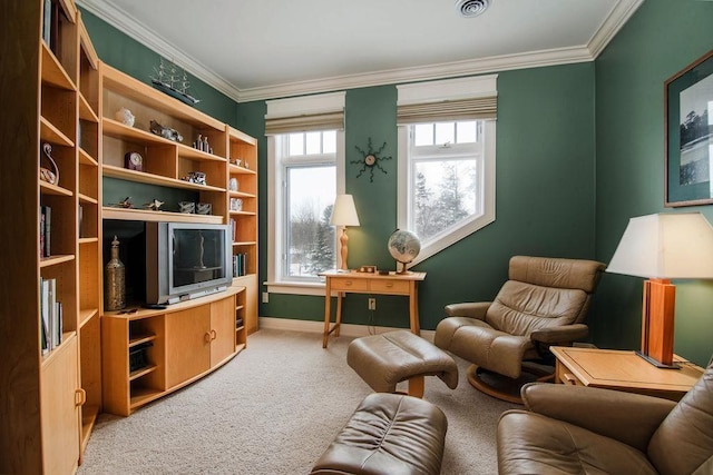 sitting room featuring carpet floors and ornamental molding