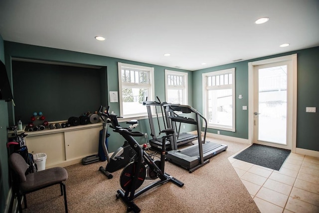 workout room with light tile patterned flooring