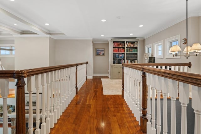 hall featuring ornamental molding and wood-type flooring