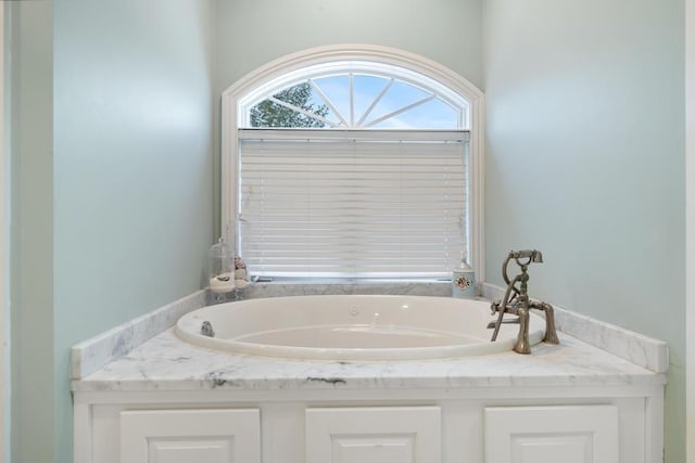 bathroom with a bathing tub