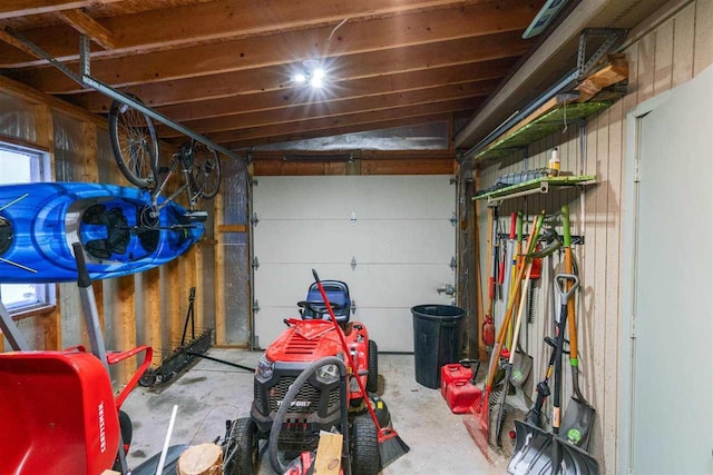 garage with wood walls