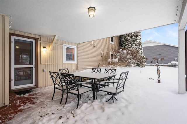 view of snow covered patio