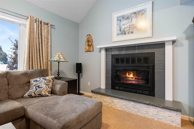 living area with lofted ceiling and carpet floors