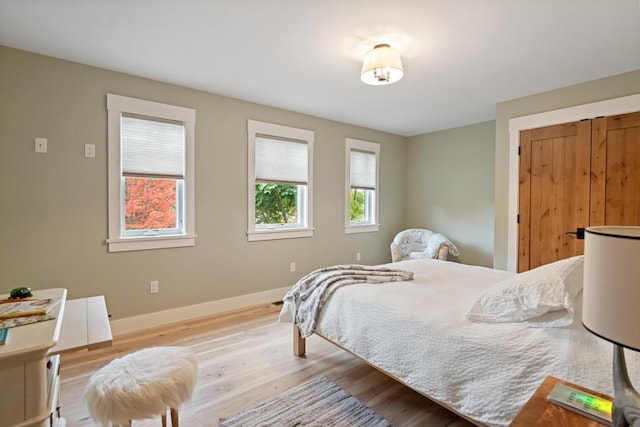 bedroom featuring light hardwood / wood-style floors