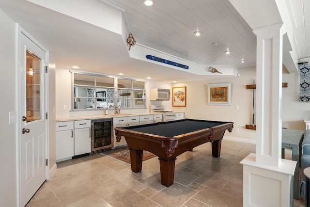 rec room featuring indoor wet bar, billiards, beverage cooler, and wooden ceiling