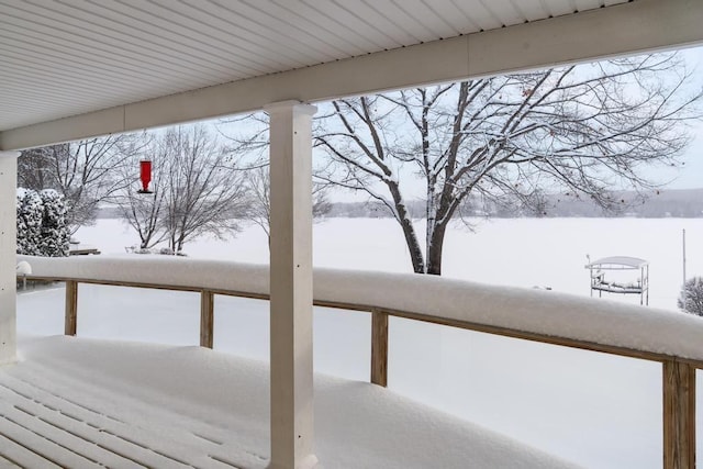 view of snow covered deck