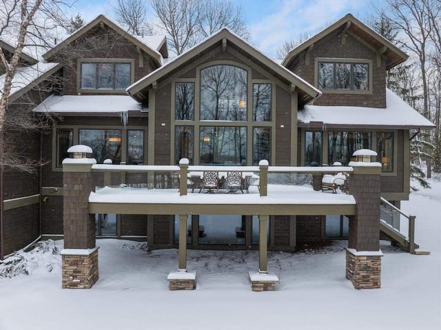 view of snow covered house