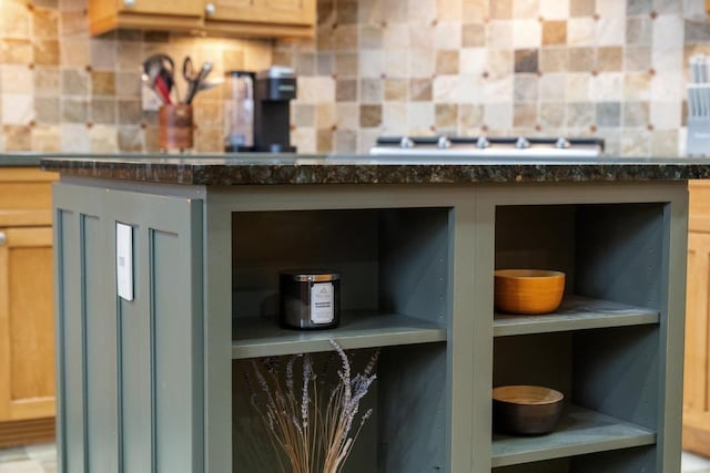 room details featuring decorative backsplash