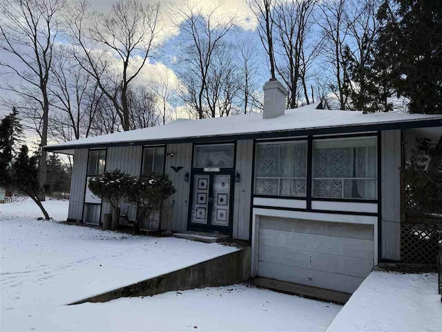 view of front of home with a garage