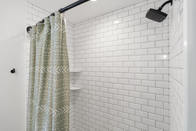 bathroom with a shower with curtain