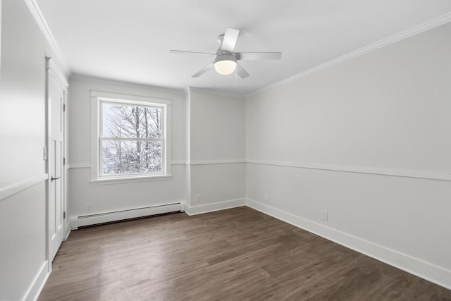 empty room with ceiling fan, baseboard heating, dark hardwood / wood-style floors, and crown molding