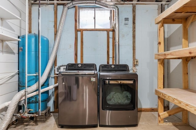 washroom featuring independent washer and dryer