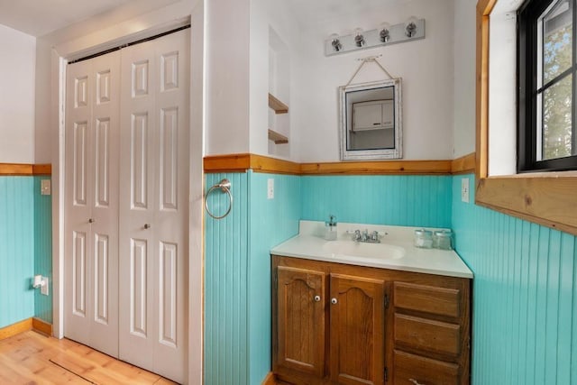 bathroom featuring vanity and wood-type flooring