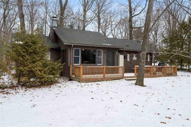 view of front of home with a wooden deck