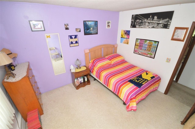 bedroom featuring carpet floors