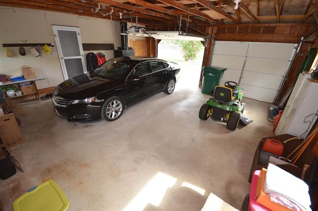 garage featuring a garage door opener