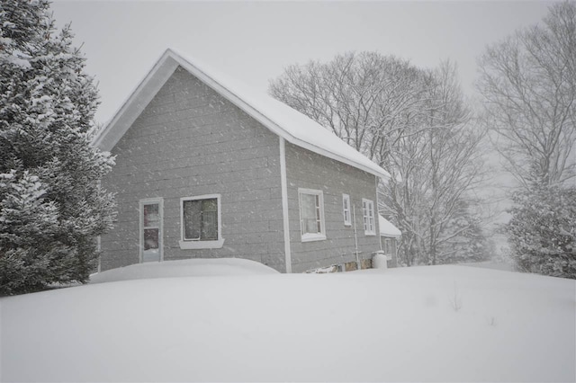 view of snow covered property