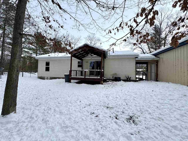 view of snow covered house