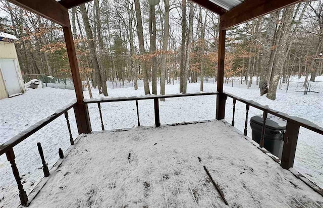 view of yard layered in snow