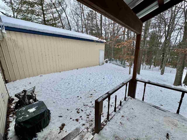 view of snowy yard