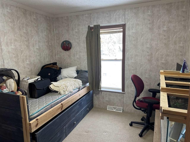 carpeted bedroom featuring ornamental molding, multiple windows, and a textured ceiling