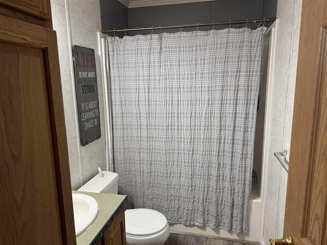 full bathroom with vanity, ornamental molding, shower / bath combo with shower curtain, and toilet