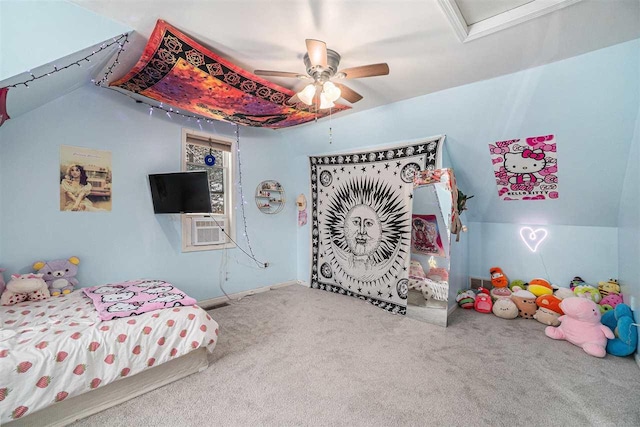 bedroom featuring carpet, cooling unit, vaulted ceiling, and ceiling fan