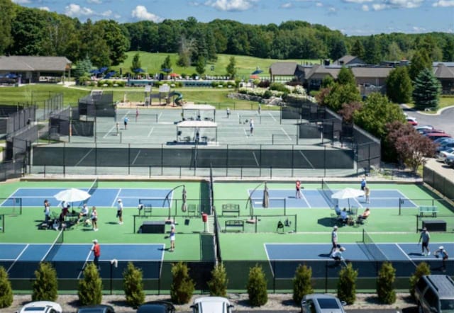 view of sport court with fence