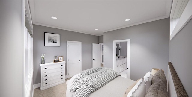 bedroom featuring ornamental molding, light carpet, and connected bathroom