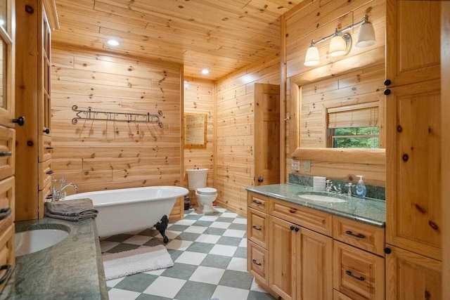 bathroom with wood ceiling, a bathing tub, vanity, toilet, and wood walls