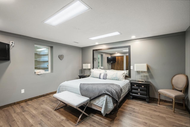 bedroom featuring wood-type flooring