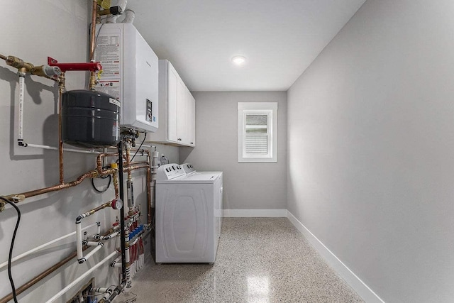 laundry area featuring cabinets and washer and dryer