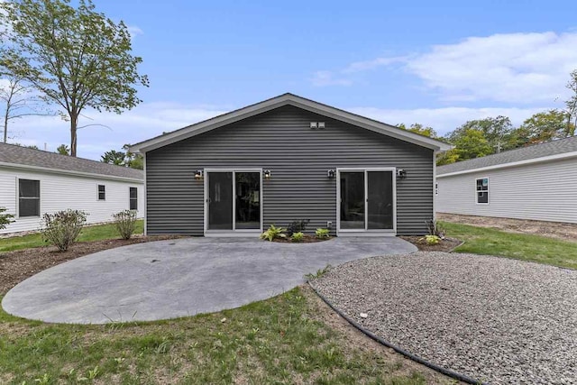 rear view of house featuring a patio area