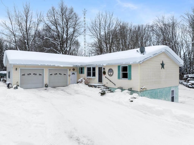 view of front of home with a garage