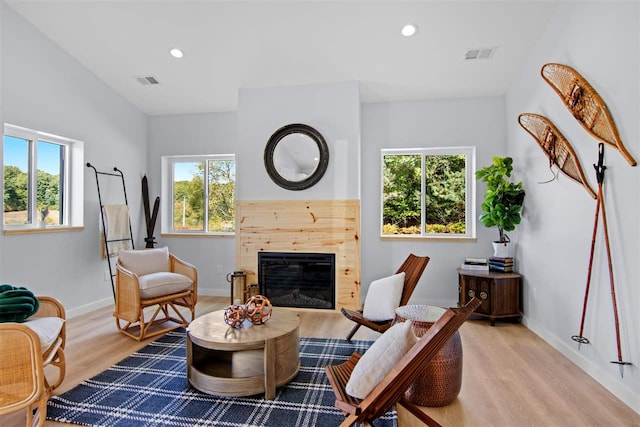 living area with light hardwood / wood-style floors