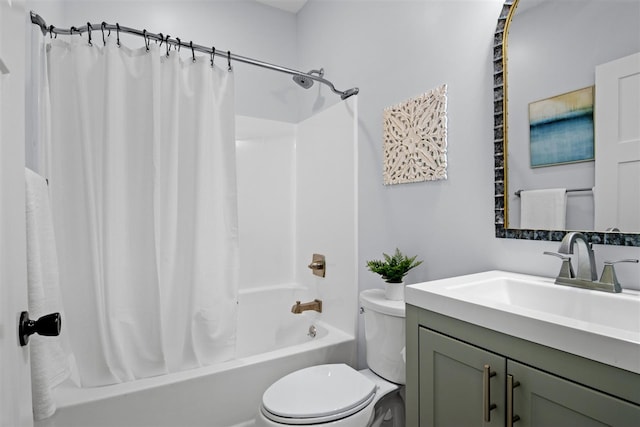 full bathroom featuring toilet, vanity, and shower / bath combo with shower curtain