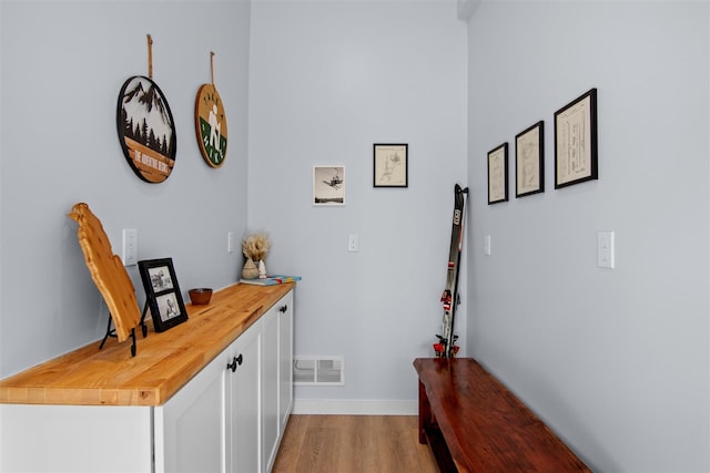 corridor featuring light hardwood / wood-style flooring