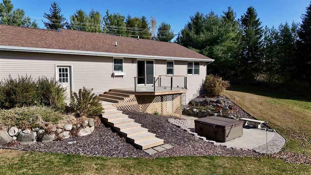 rear view of house with a lawn