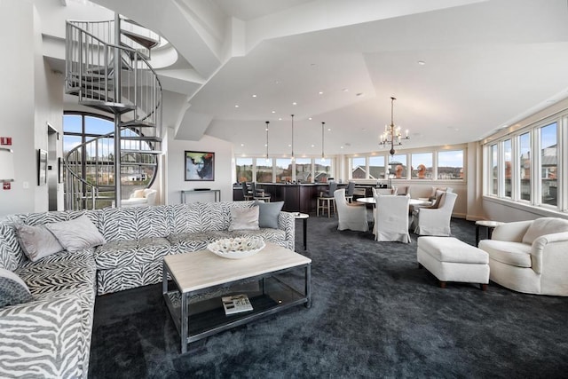 carpeted living room with plenty of natural light and a chandelier